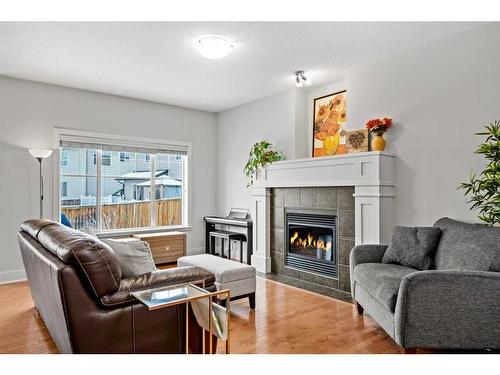 90 Royal Oak Drive Nw, Calgary, AB - Indoor Photo Showing Living Room With Fireplace
