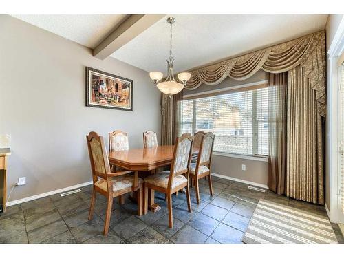 335 Cresthaven Place Sw, Calgary, AB - Indoor Photo Showing Dining Room