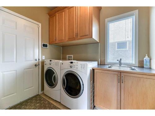 335 Cresthaven Place Sw, Calgary, AB - Indoor Photo Showing Laundry Room