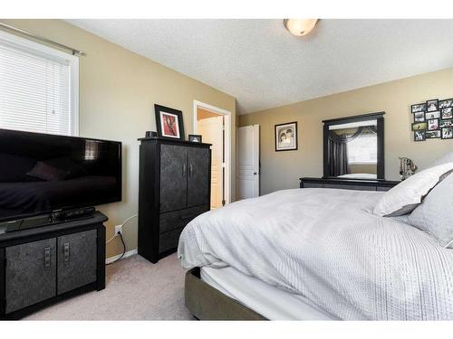 335 Cresthaven Place Sw, Calgary, AB - Indoor Photo Showing Bedroom