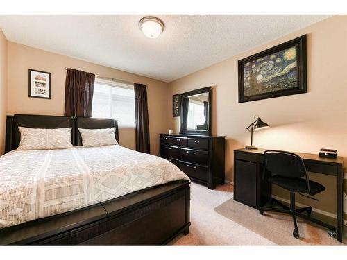 335 Cresthaven Place Sw, Calgary, AB - Indoor Photo Showing Bedroom