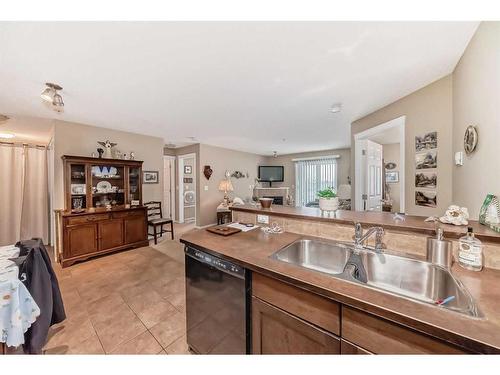 2304-43 Country Village Lane Ne, Calgary, AB - Indoor Photo Showing Kitchen With Double Sink
