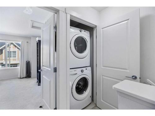 978 Sherwood Boulevard Nw, Calgary, AB - Indoor Photo Showing Laundry Room