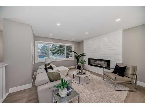 3403 Boulton Road Nw, Calgary, AB - Indoor Photo Showing Living Room With Fireplace
