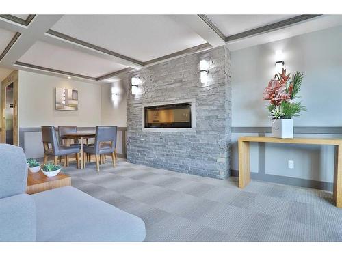3309-450 Kincora Glen Road Nw, Calgary, AB - Indoor With Fireplace