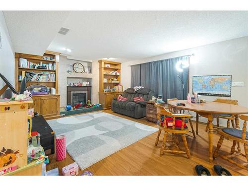 8328 Edgevalley Drive Nw, Calgary, AB - Indoor With Fireplace
