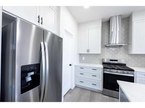 395 Savanna Way Ne, Calgary, AB - Indoor Photo Showing Kitchen With Stainless Steel Kitchen With Upgraded Kitchen
