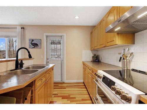 115 Valley Creek Crescent Nw, Calgary, AB - Indoor Photo Showing Kitchen With Double Sink