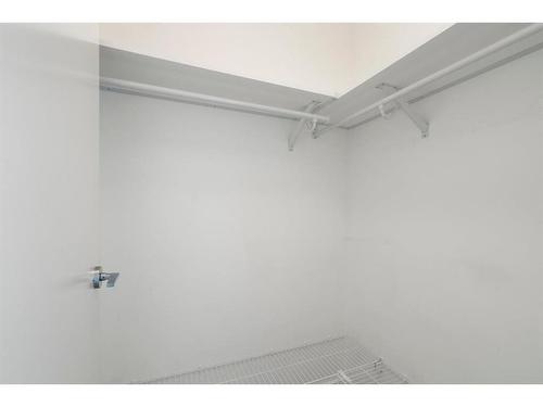 210-138 Waterfront Court Sw, Calgary, AB - Indoor With Storage