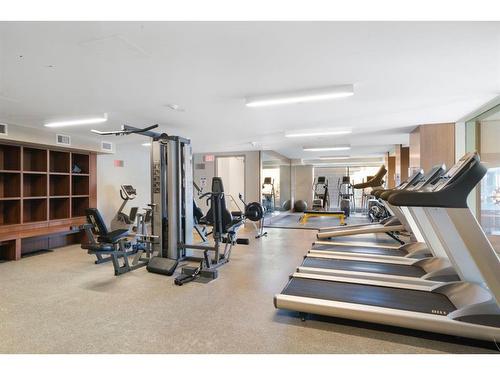 210-138 Waterfront Court Sw, Calgary, AB - Indoor Photo Showing Gym Room