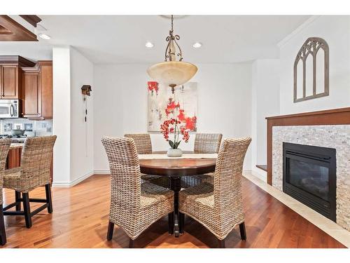 4024 Garrison Boulevard Sw, Calgary, AB - Indoor Photo Showing Dining Room With Fireplace