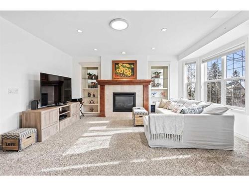4024 Garrison Boulevard Sw, Calgary, AB - Indoor Photo Showing Living Room With Fireplace
