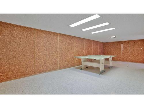 53 White Oak Crescent Sw, Calgary, AB - Indoor Photo Showing Basement