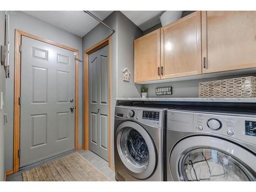 258 Arbour Vista Road Nw, Calgary, AB - Indoor Photo Showing Laundry Room