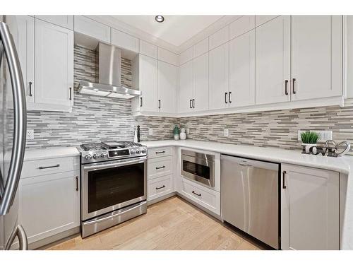 1321-2330 Fish Creek Boulevard Sw, Calgary, AB - Indoor Photo Showing Kitchen With Upgraded Kitchen