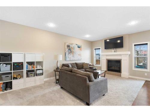 276 Walden Parade Se, Calgary, AB - Indoor Photo Showing Living Room With Fireplace