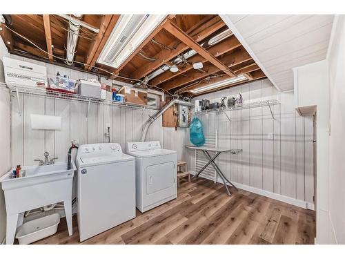 60 Glacier Drive Sw, Calgary, AB - Indoor Photo Showing Laundry Room