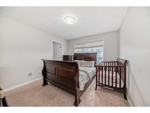 310 Evansridge Common Nw, Calgary, AB - Indoor Photo Showing Bedroom