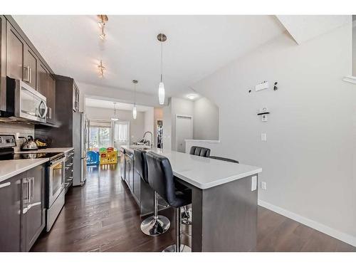 310 Evansridge Common Nw, Calgary, AB - Indoor Photo Showing Kitchen With Upgraded Kitchen