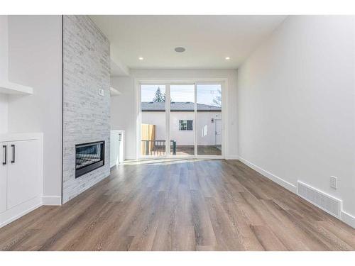 4510 72 Street Nw, Calgary, AB - Indoor With Fireplace