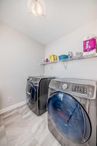 6 Legacy Glen Terrace Se, Calgary, AB - Indoor Photo Showing Laundry Room
