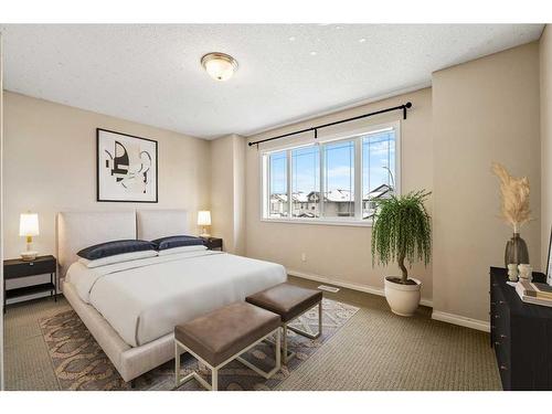 31 Bridleridge Green Sw, Calgary, AB - Indoor Photo Showing Bedroom