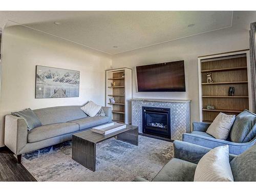 19 28 Avenue Sw, Calgary, AB - Indoor Photo Showing Living Room With Fireplace