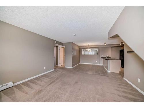 17-21 Mckenzie Towne Gate Se, Calgary, AB - Indoor Photo Showing Other Room