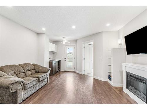 139 Saddlecrest Close Ne, Calgary, AB - Indoor Photo Showing Living Room With Fireplace