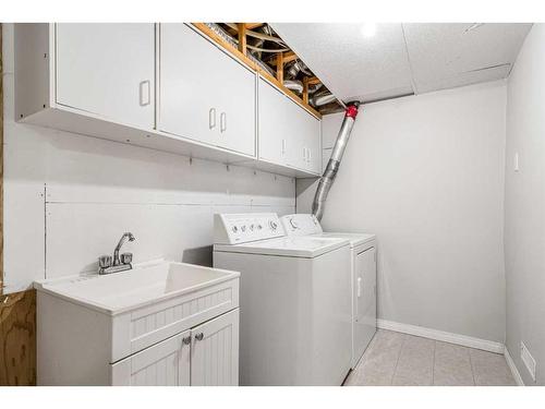 139 Saddlecrest Close Ne, Calgary, AB - Indoor Photo Showing Laundry Room