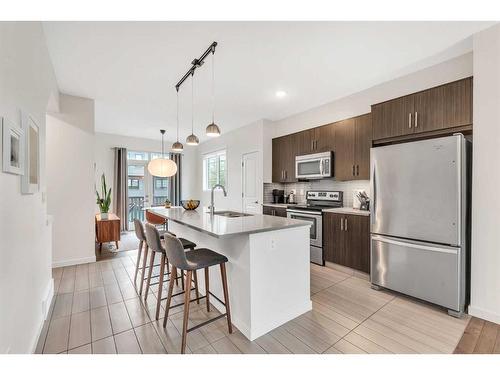 58 Walden Walk Se, Calgary, AB - Indoor Photo Showing Kitchen With Stainless Steel Kitchen With Upgraded Kitchen