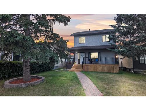 12 Cedardale Crescent Sw, Calgary, AB - Outdoor With Deck Patio Veranda