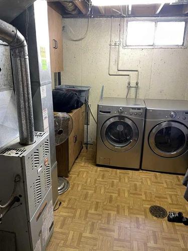 892 Abbotsford Drive Ne, Calgary, AB - Indoor Photo Showing Laundry Room