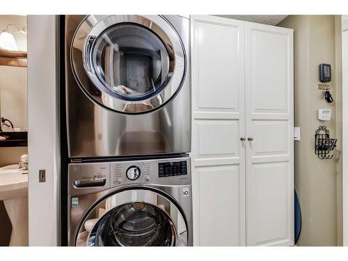 48 Arbour Crest Court Nw, Calgary, AB - Indoor Photo Showing Laundry Room