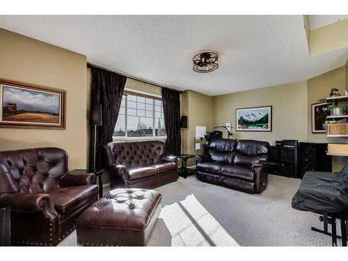 48 Arbour Crest Court Nw, Calgary, AB - Indoor Photo Showing Living Room