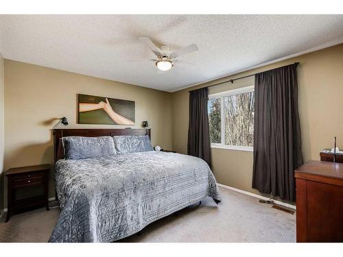 48 Arbour Crest Court Nw, Calgary, AB - Indoor Photo Showing Bedroom