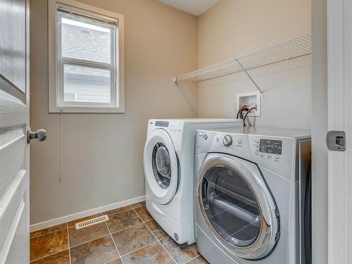 20 Copperpond Heights Se, Calgary, AB - Indoor Photo Showing Laundry Room