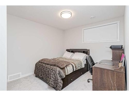 39 Silverado Crest Place Sw, Calgary, AB - Indoor Photo Showing Bedroom