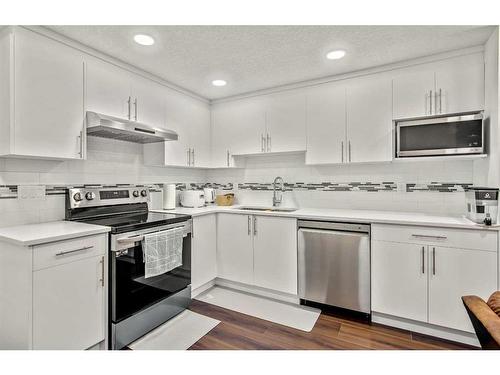 57 Masters Street Se, Calgary, AB - Indoor Photo Showing Kitchen With Upgraded Kitchen
