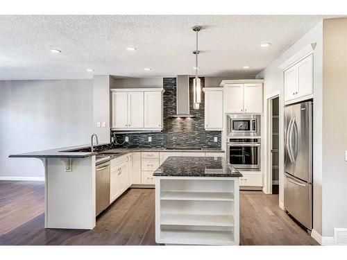 69 Evansfield Park Nw, Calgary, AB - Indoor Photo Showing Kitchen With Upgraded Kitchen