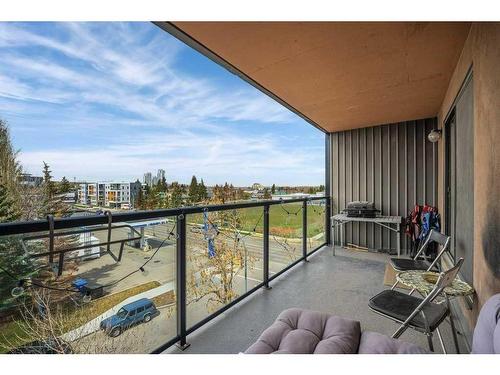 401-1900 25A Street Sw, Calgary, AB - Outdoor With Balcony With View With Exterior