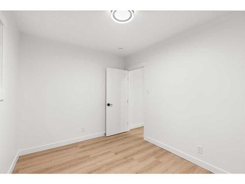 19 Arbour Crescent Se, Calgary, AB - Indoor Photo Showing Other Room