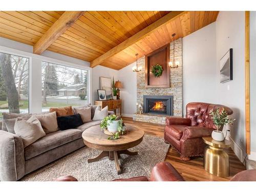 2419 Deer Side Drive Se, Calgary, AB - Indoor Photo Showing Living Room With Fireplace