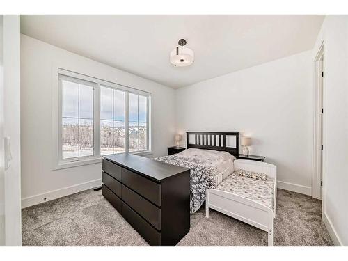 59 Timberline Point Sw, Calgary, AB - Indoor Photo Showing Bedroom