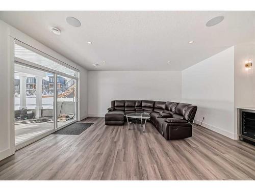 59 Timberline Point Sw, Calgary, AB - Indoor With Fireplace