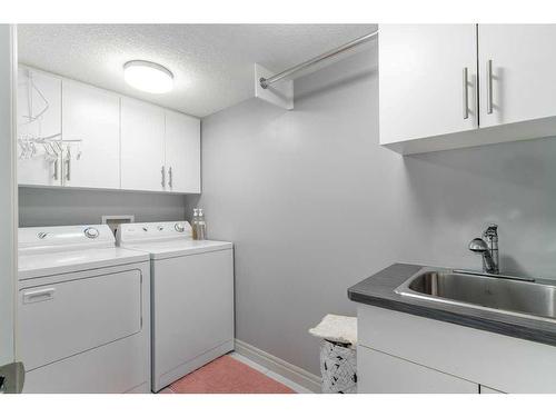 98 Discovery Ridge Gardens Sw, Calgary, AB - Indoor Photo Showing Laundry Room