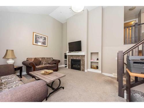 169 Cityscape Way Ne, Calgary, AB - Indoor Photo Showing Living Room With Fireplace
