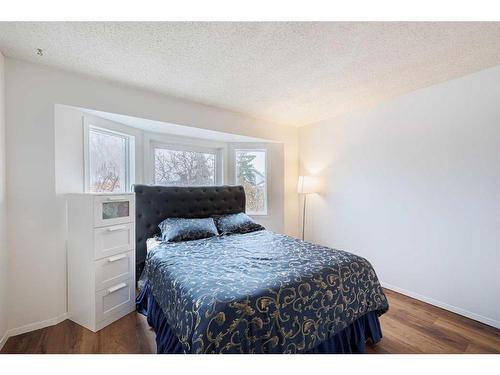 76 Riverbrook Way Se, Calgary, AB - Indoor Photo Showing Bedroom