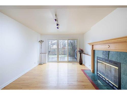 76 Riverbrook Way Se, Calgary, AB - Indoor With Fireplace