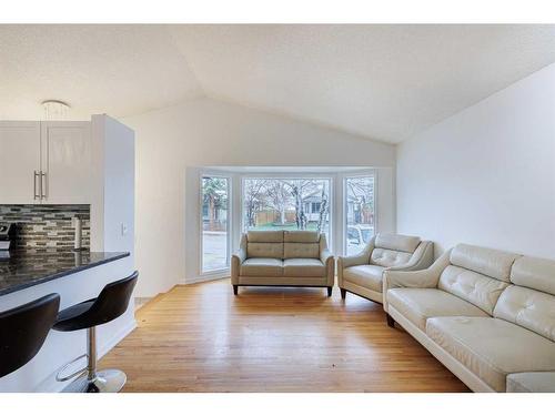 76 Riverbrook Way Se, Calgary, AB - Indoor Photo Showing Living Room